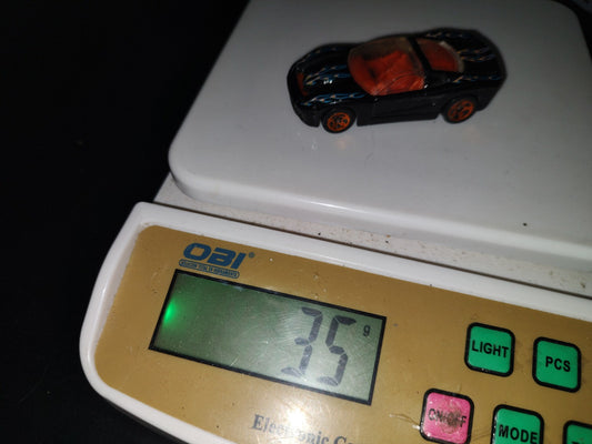 A3- Coche A Escala. 40 Somethin Hot Wheels - 2001