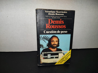 209- Demis Roussos. Cuestión De Peso - Planeta. Primera Edición 1983