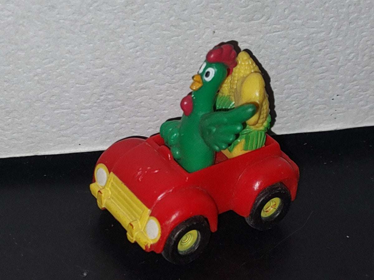 A3- Figurita De Kellogg'S. Cornelio Montado En Carrito Con Mazorcas En La Parte Posterior - 90'S