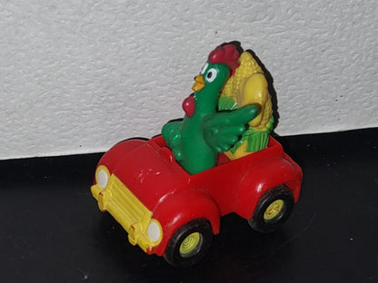 A3- Figurita De Kellogg'S. Cornelio Montado En Carrito Con Mazorcas En La Parte Posterior - 90'S