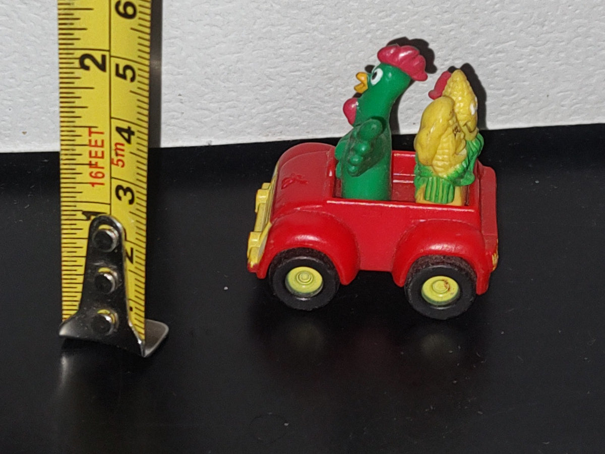 A3- Figurita De Kellogg'S. Cornelio Montado En Carrito Con Mazorcas En La Parte Posterior - 90'S