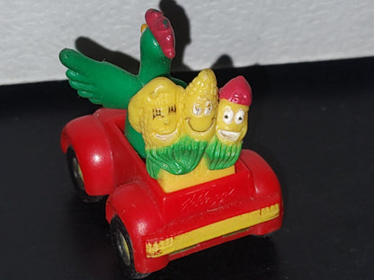 A3- Figurita De Kellogg'S. Cornelio Montado En Carrito Con Mazorcas En La Parte Posterior - 90'S