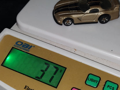 A3- Coche Escala Hot Wheels. Dodge Viper Gts-R - Color Café Con Franja Negra - 2000'S