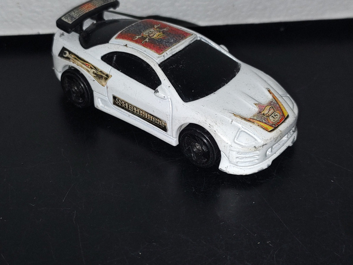 A3- Coche A Escala. Mcdonald'S. Hot Wheels. Mitsubishi Scorchers Blanco - 2002 Mattel Inc.