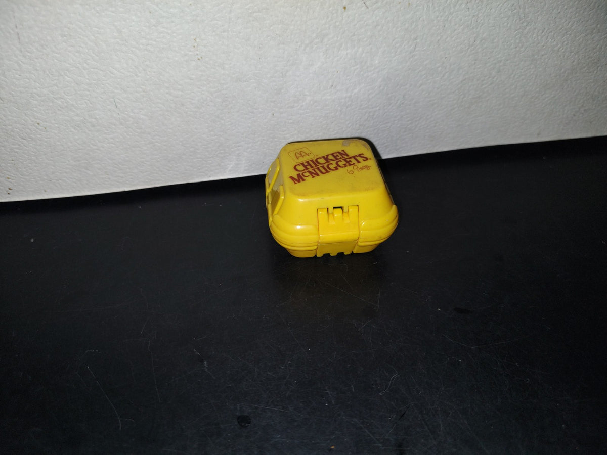 A3- Figura Mcdonald'S. Caja Chicken Mcnuggets. Dinosaurio Transformer - 1990
