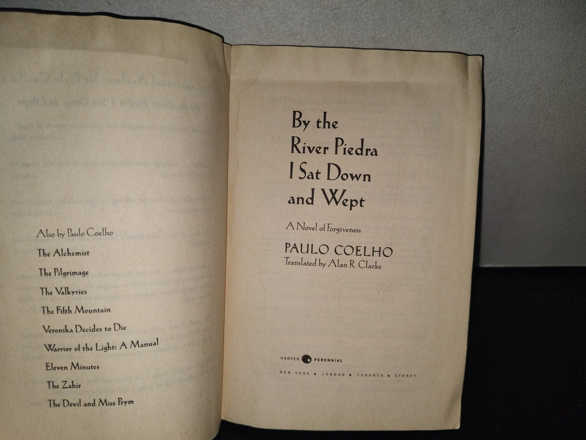 215- By The River Piedra I Sat Down And Wept - Paulo Coelho - Herper Perennial, 2006