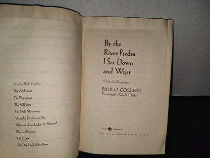 215- By The River Piedra I Sat Down And Wept - Paulo Coelho - Herper Perennial, 2006