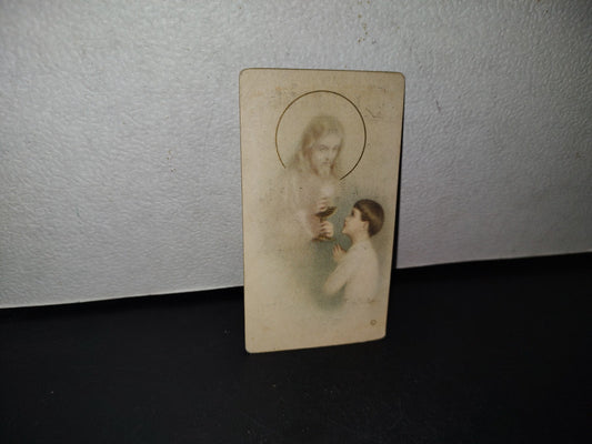 A10C1-2- Antigua Estampita Del Santo Señor Jesucristo Con El Cáliz Dándole La Hostia A Un Niño 1946