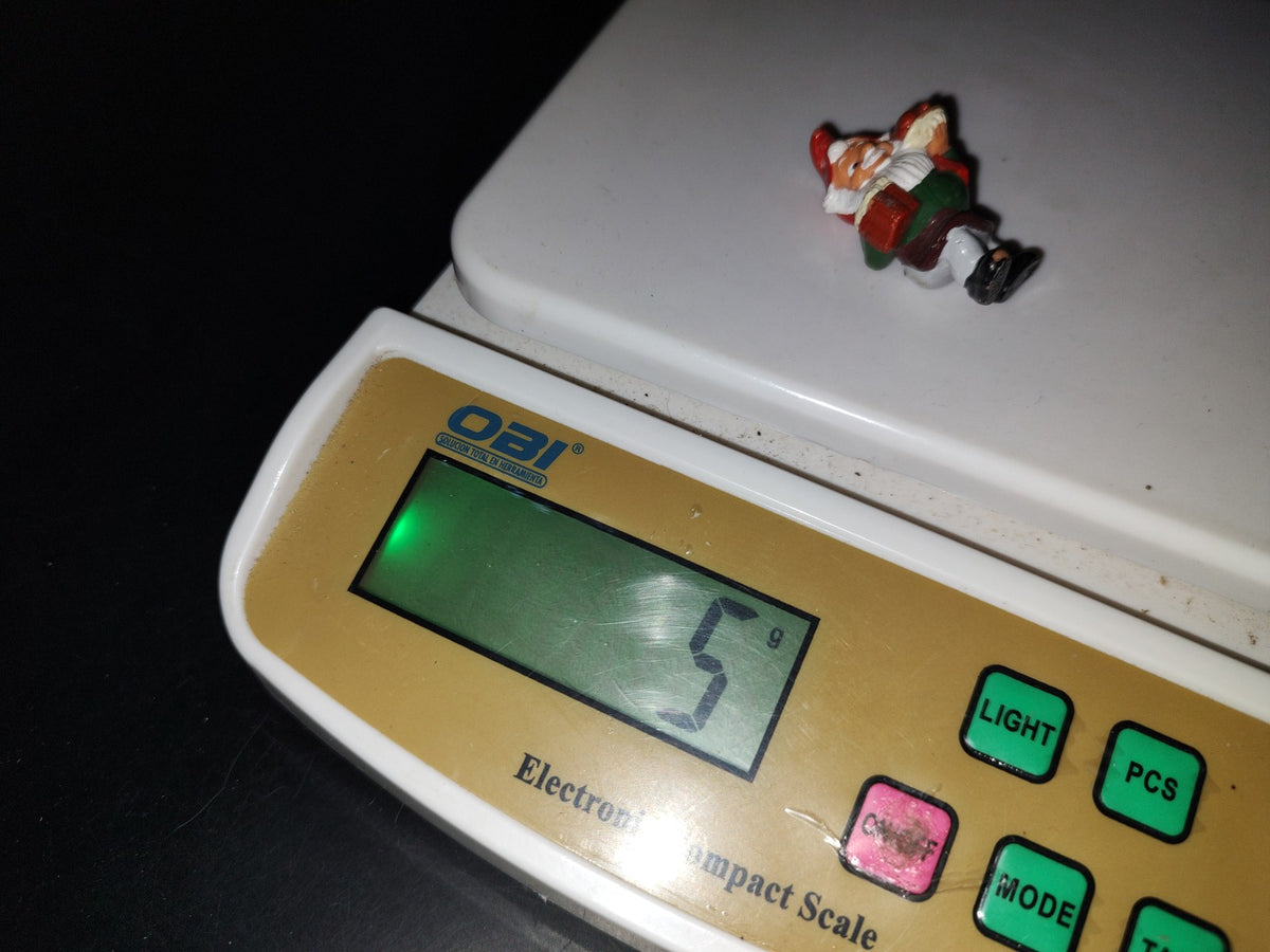 A3- Mini Figurita. Duende Navideño Con Cena En Brazo - 90'S