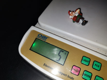 A3- Mini Figurita. Duende Navideño Con Cena En Brazo - 90'S