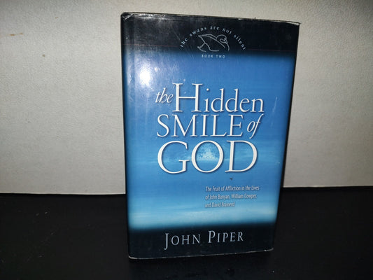 220- The Hidden Smile Of God - John Piper. Crossway Books. First Printing 2001