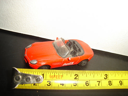 A2- Carrito Con Rotulado De ”Coca Cola” Marca Welly. Bmw Z8