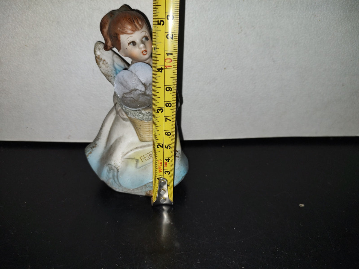 A5- Figura De Porcelana: Ángel Sosteniendo Canasto Con Flores - 70'S