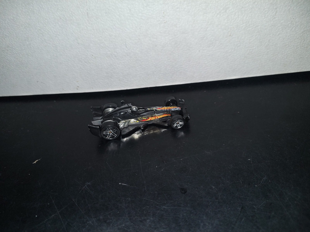 A3- Carrito Hot Wheels. F-Racer - 2003 Mattel. Malaysia