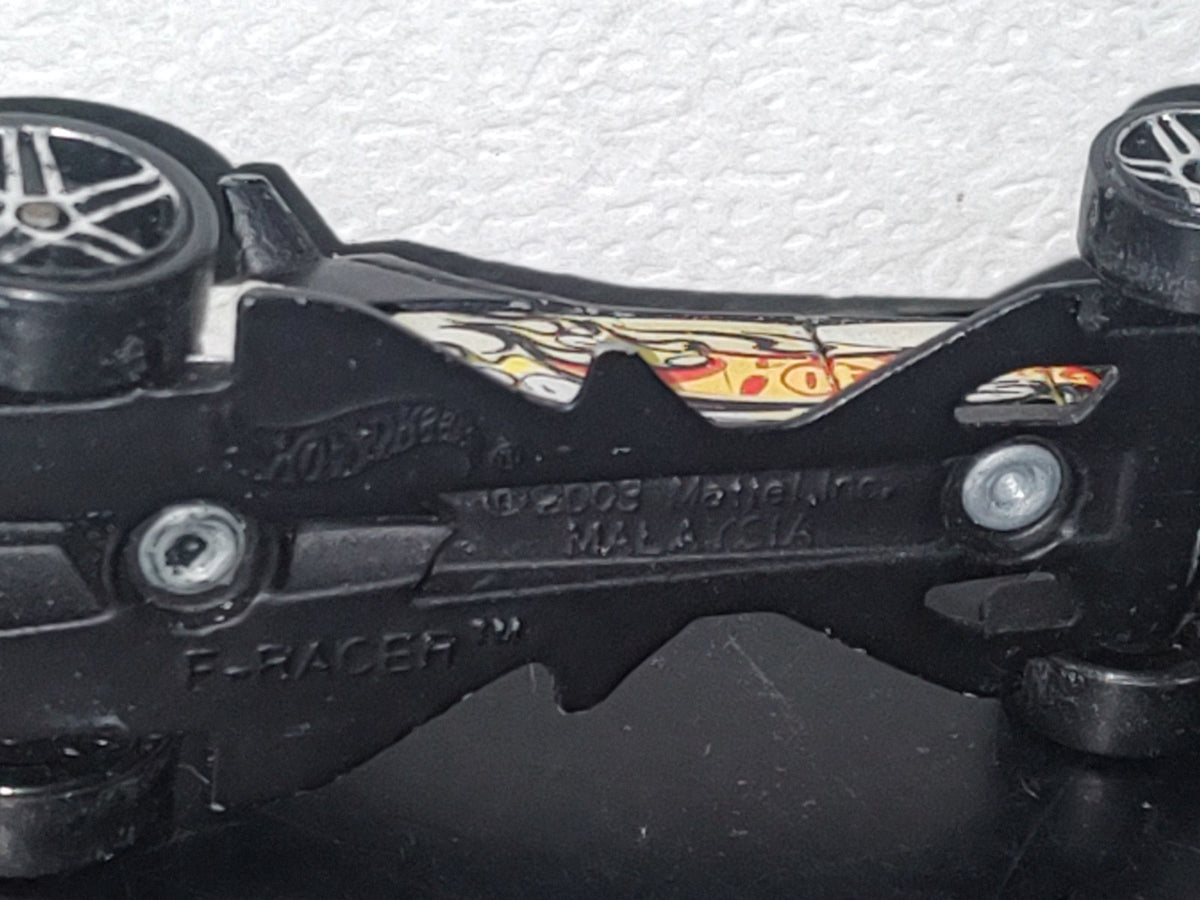 A3- Carrito Hot Wheels. F-Racer - 2003 Mattel. Malaysia