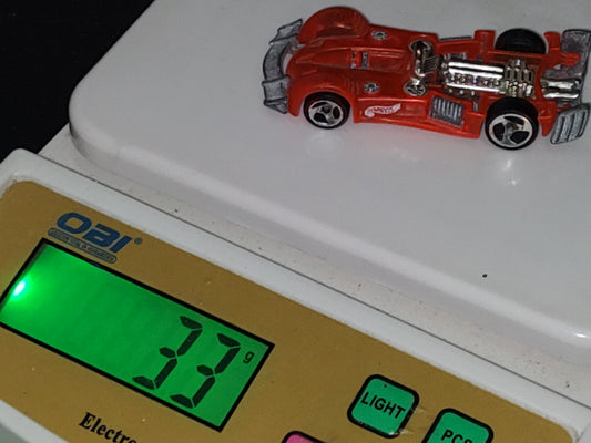 A5- Carro Hot Wheels: Road Rocket. Malaysia, 1995 Mattel Inc.