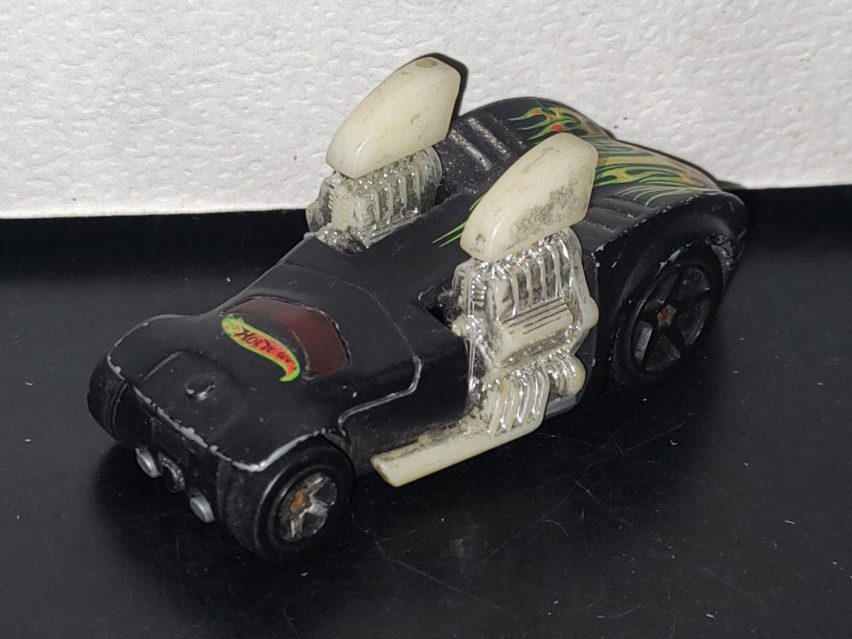 A5- Carro Hot Wheels: Twin Mill® Negro ©2003 Mattel Inc.